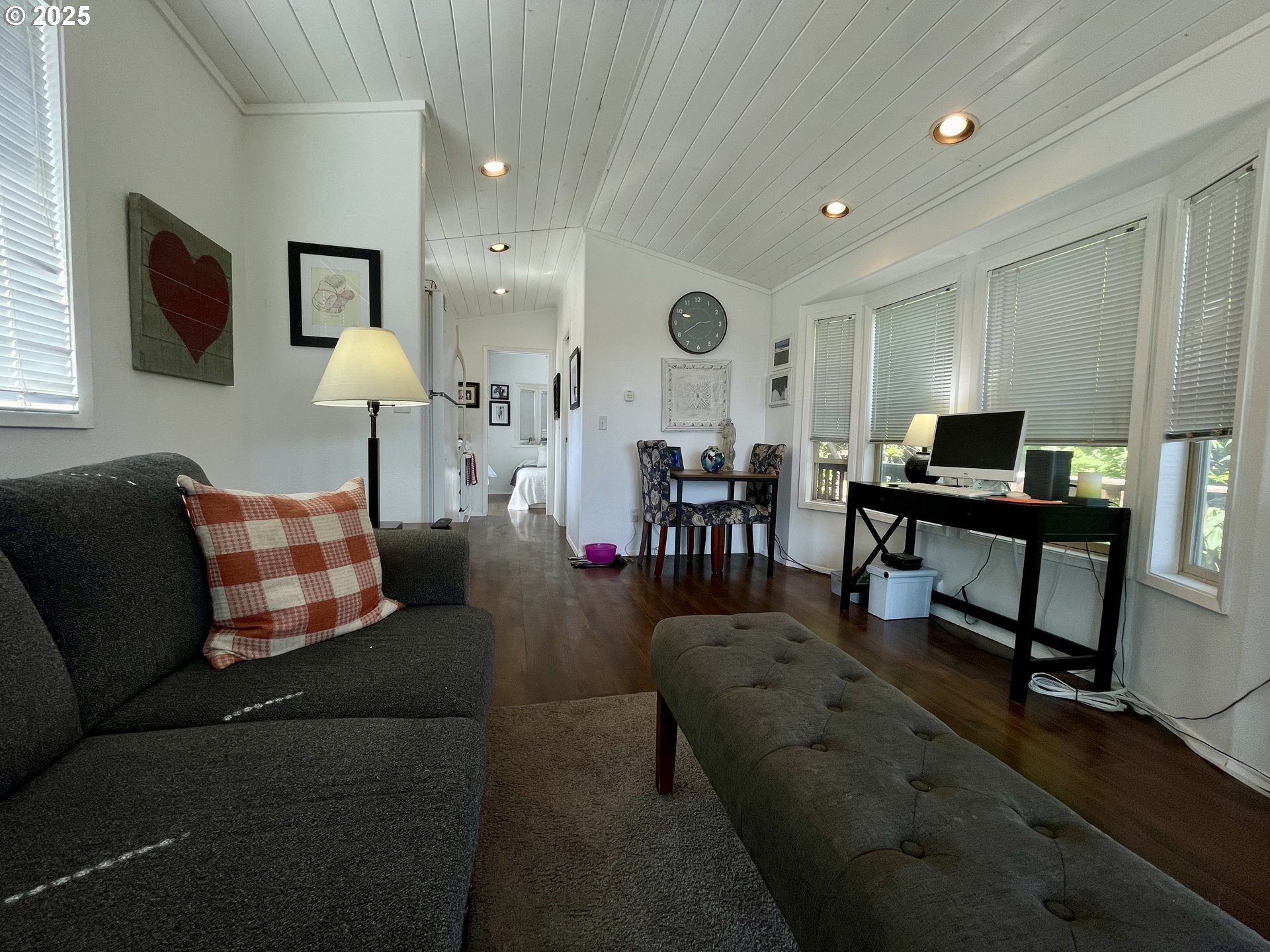 19921 Whaleshead Road, Unit T5 Brookings, OR 97415 - Photo 13 of 34 a living room with furniture and wooden floor