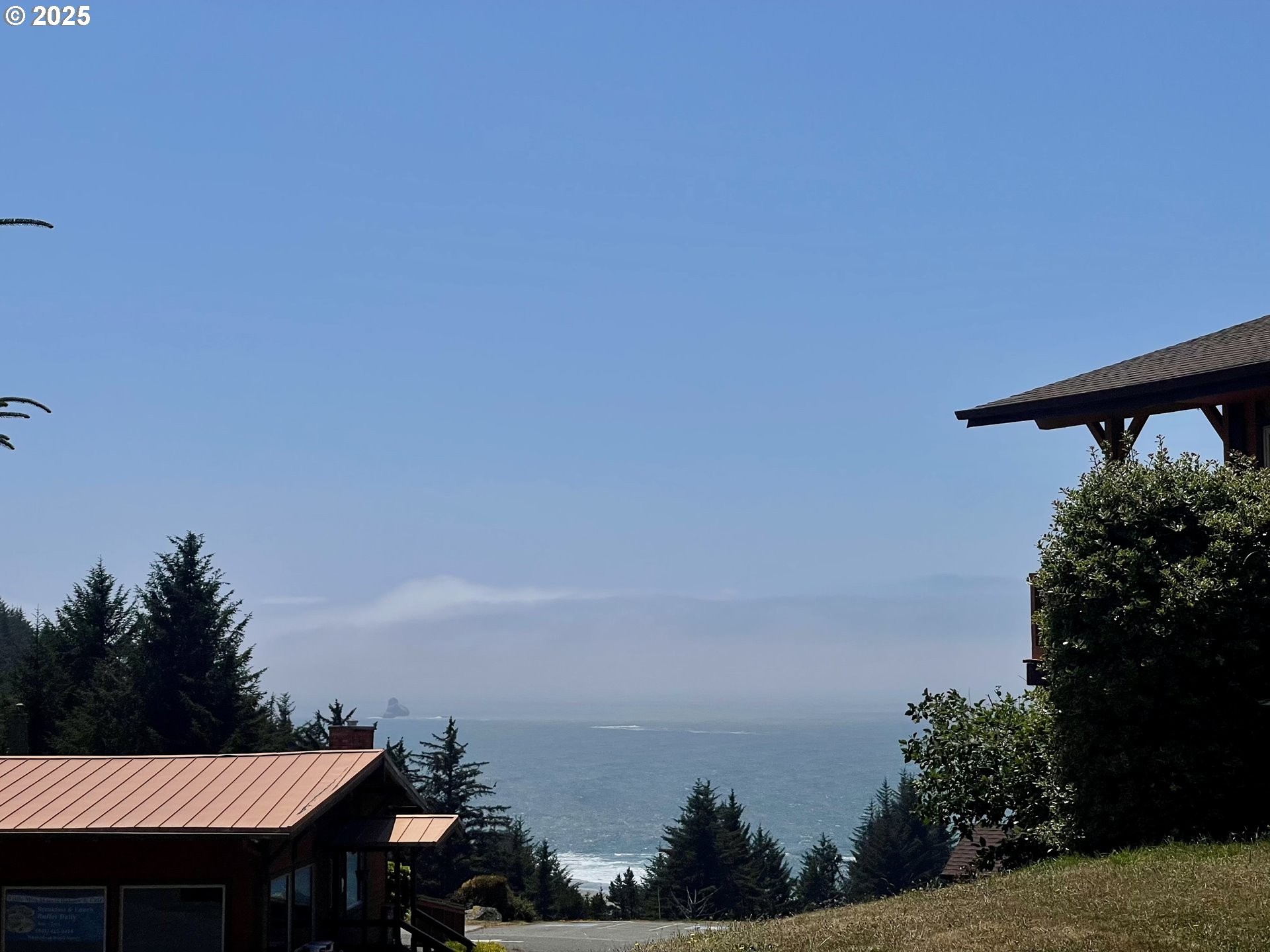 19921 Whaleshead Road, Unit T5 Brookings, OR 97415 - Photo 20 of 34 a terrace with a bench and lake view
