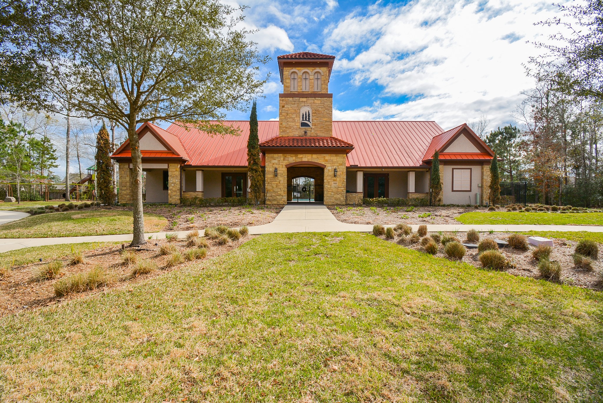 19642 Rupetti Drive New Caney, TX 77357 - Photo 12 of 14 a front view of a houses with yard and swimming pool