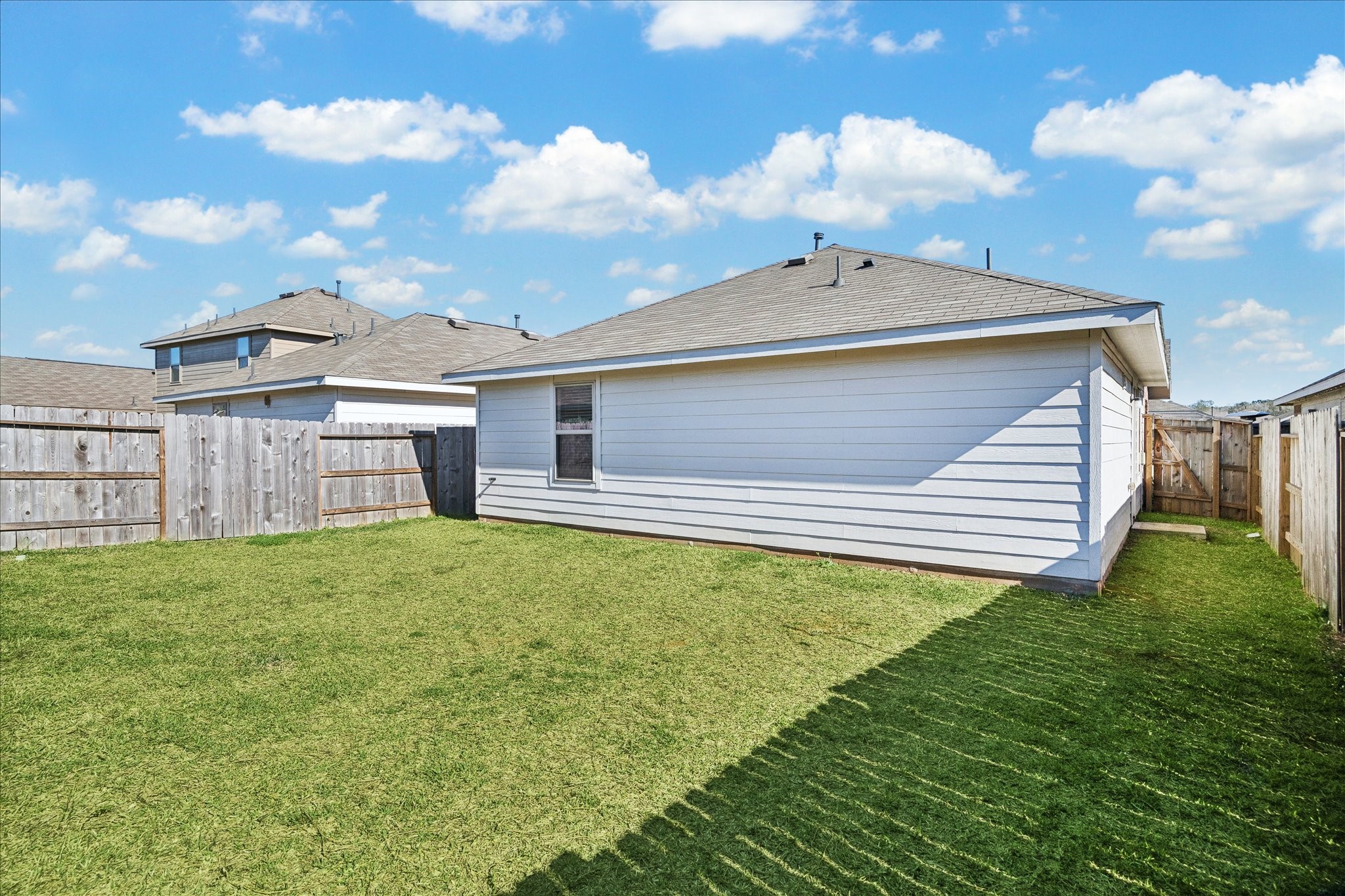 19642 Rupetti Drive New Caney, TX 77357 - Photo 6 of 14 a front view of a house with a garden