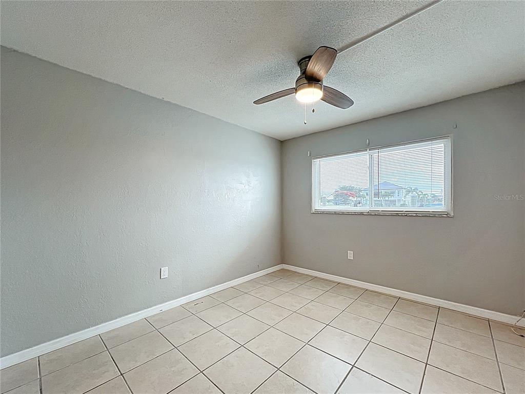 11705 3rd Street East, Unit 4 Treasure Island, FL 33706 - Photo 14 of 23 a view of an empty room with a window