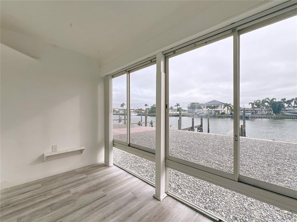 11705 3rd Street East, Unit 4 Treasure Island, FL 33706 - Photo 18 of 23 a view of a room with wooden floor and city view