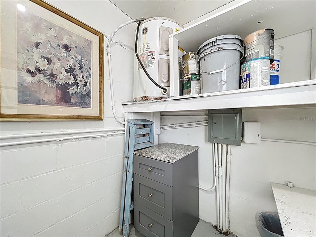 11705 3rd Street East, Unit 4 Treasure Island, FL 33706 - Photo 20 of 23 a bathroom with a sink and a mirror