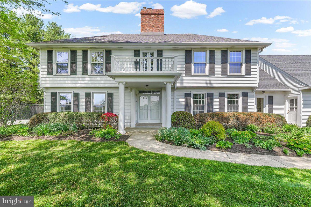a front view of a house with porch and porch