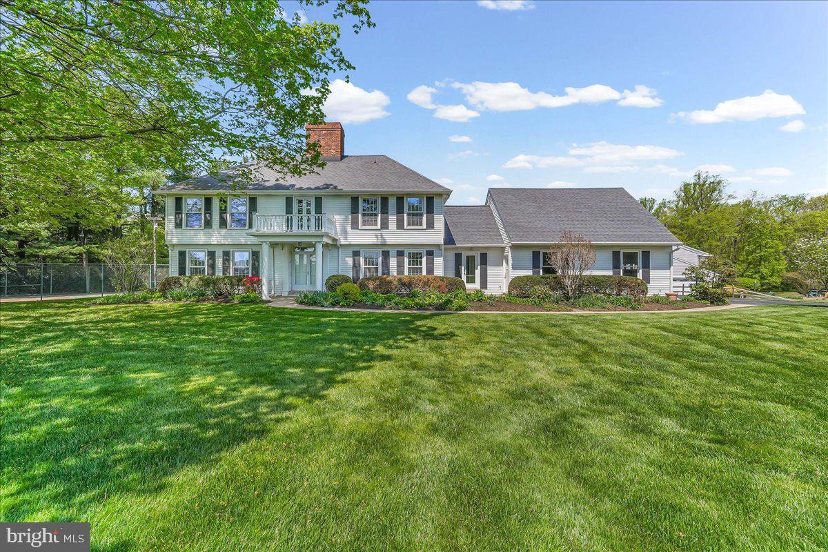 701 Pheasant Run Kennett Square, PA 19348 - Photo 2 of 41 a front view of a house with a garden