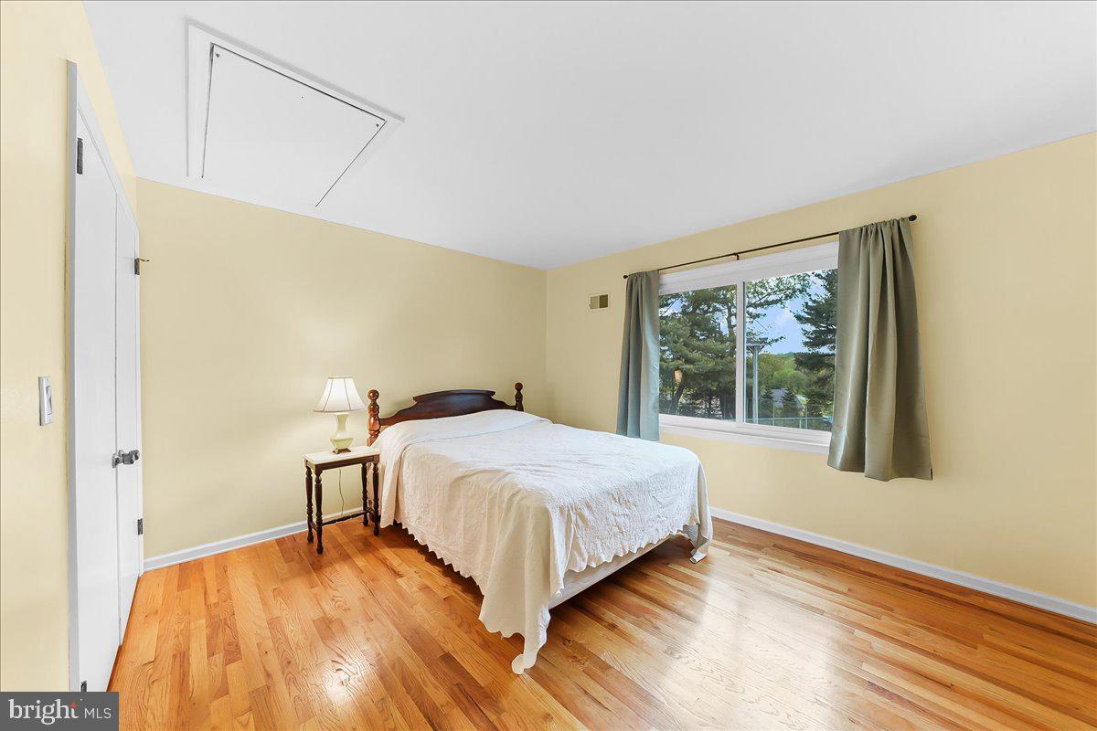 701 Pheasant Run Kennett Square, PA 19348 - Photo 26 of 41 a bedroom with a bed and a window