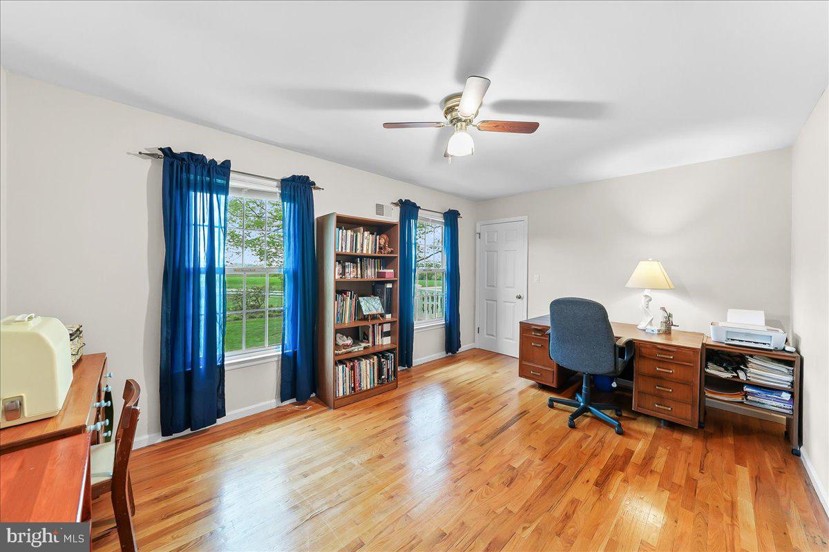 701 Pheasant Run Kennett Square, PA 19348 - Photo 27 of 41 a workspace with furniture hardwood and a window