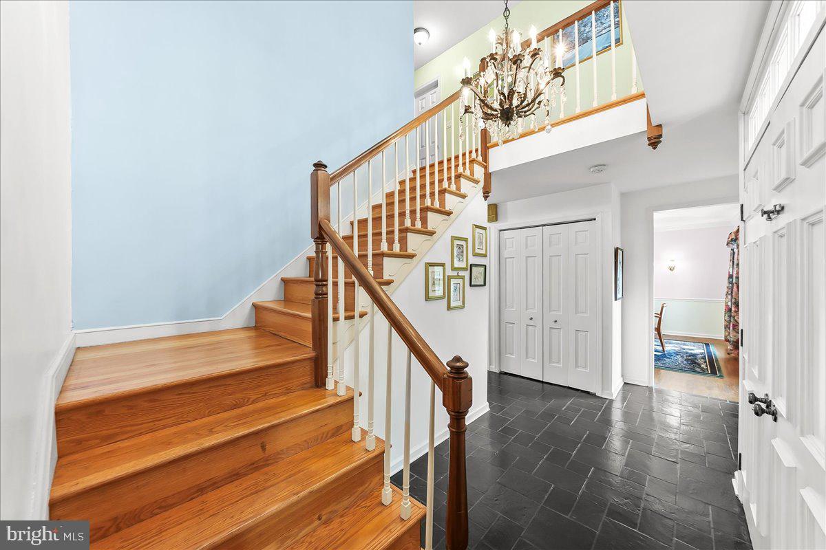 701 Pheasant Run Kennett Square, PA 19348 - Photo 4 of 41 a view of entryway and hall with wooden floor