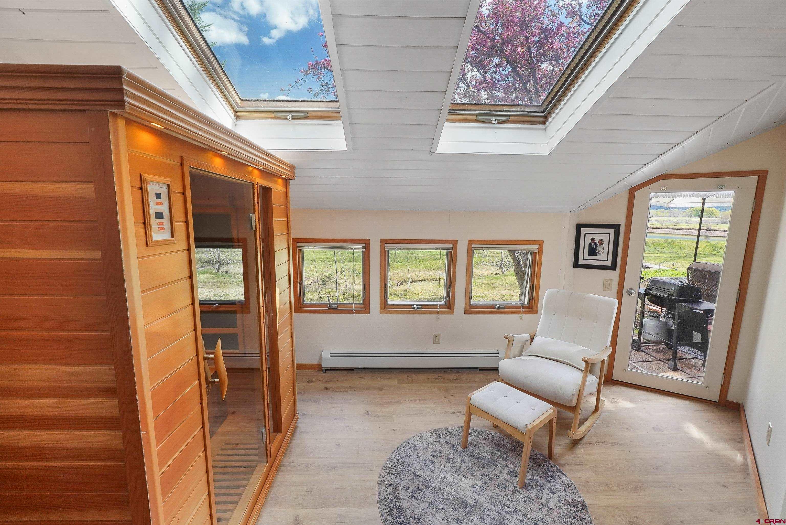 528 Cottonwood Creek Road Durango, CO 81301 - Photo 23 of 39 a living room with furniture and a window