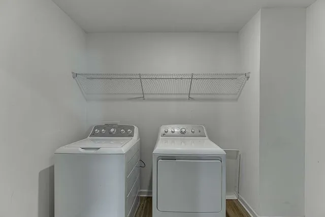 a utility room with dryer and washer