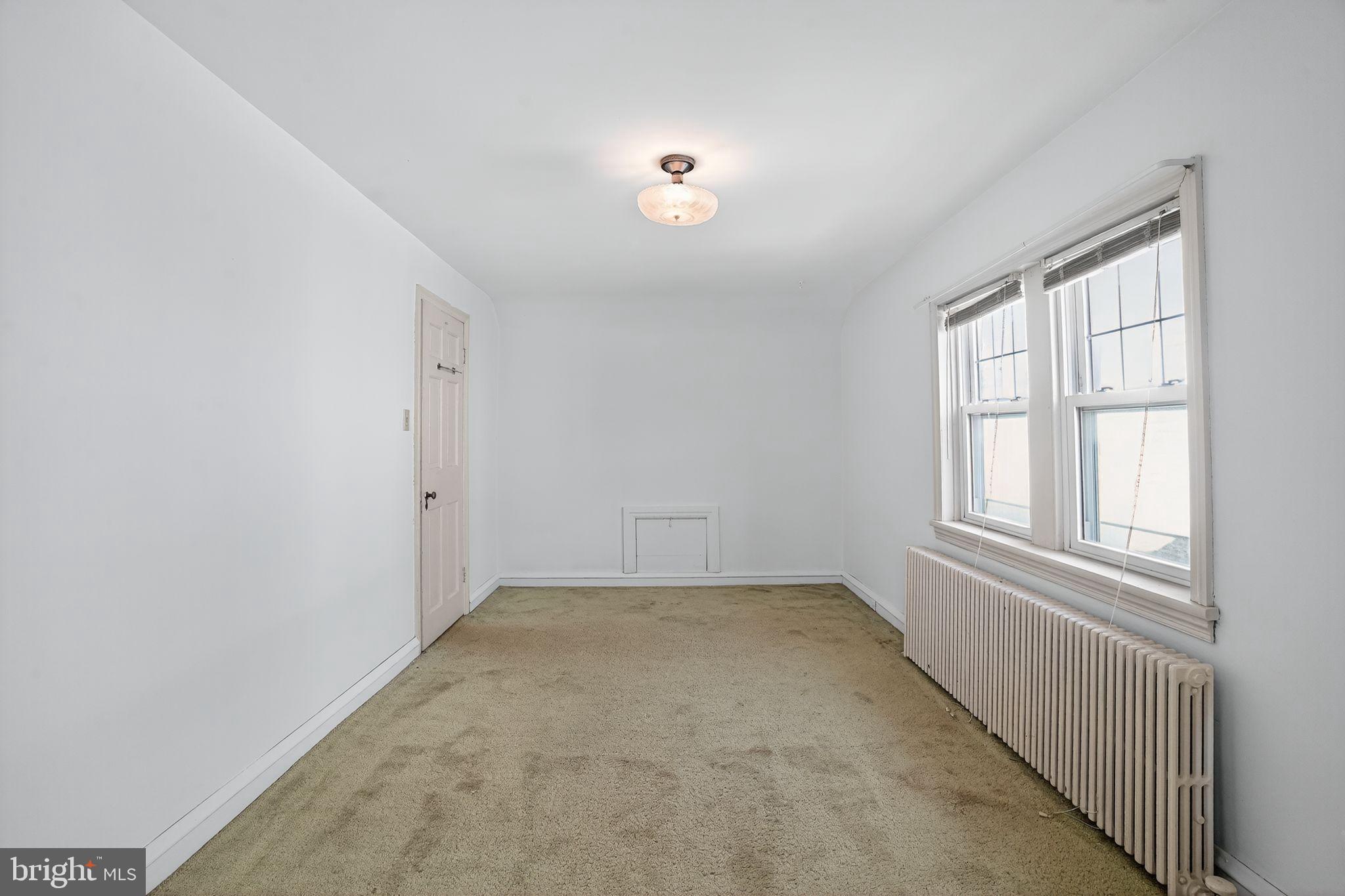944 Galbraith Avenue Marcus Hook, PA 19061 - Photo 15 of 26 an empty room with windows