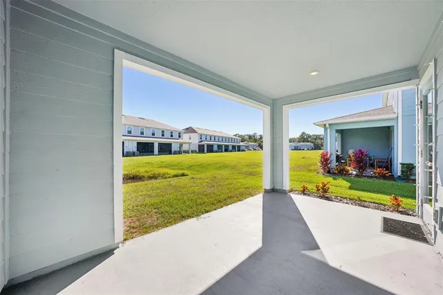 a view of swimming pool with a yard