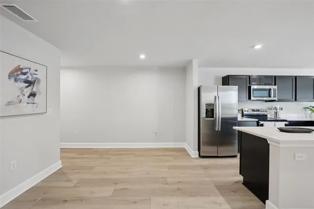 a view of a kitchen with a sink