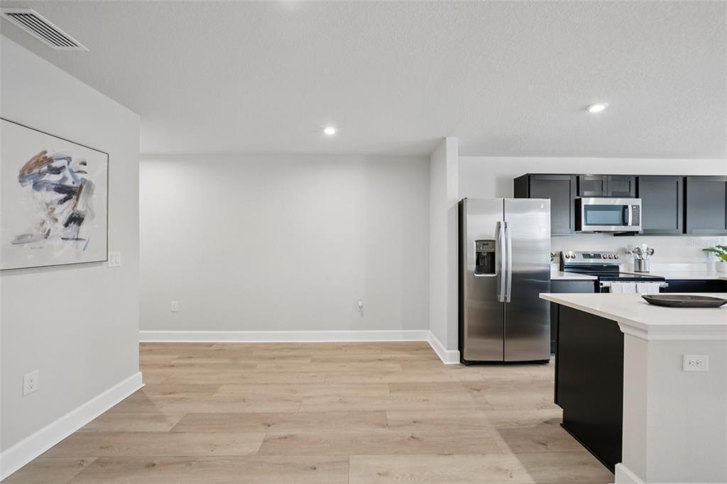 12057 Grizzly Lane New Port Richey, FL 34654 - Photo 7 of 25 a view of a kitchen with a sink