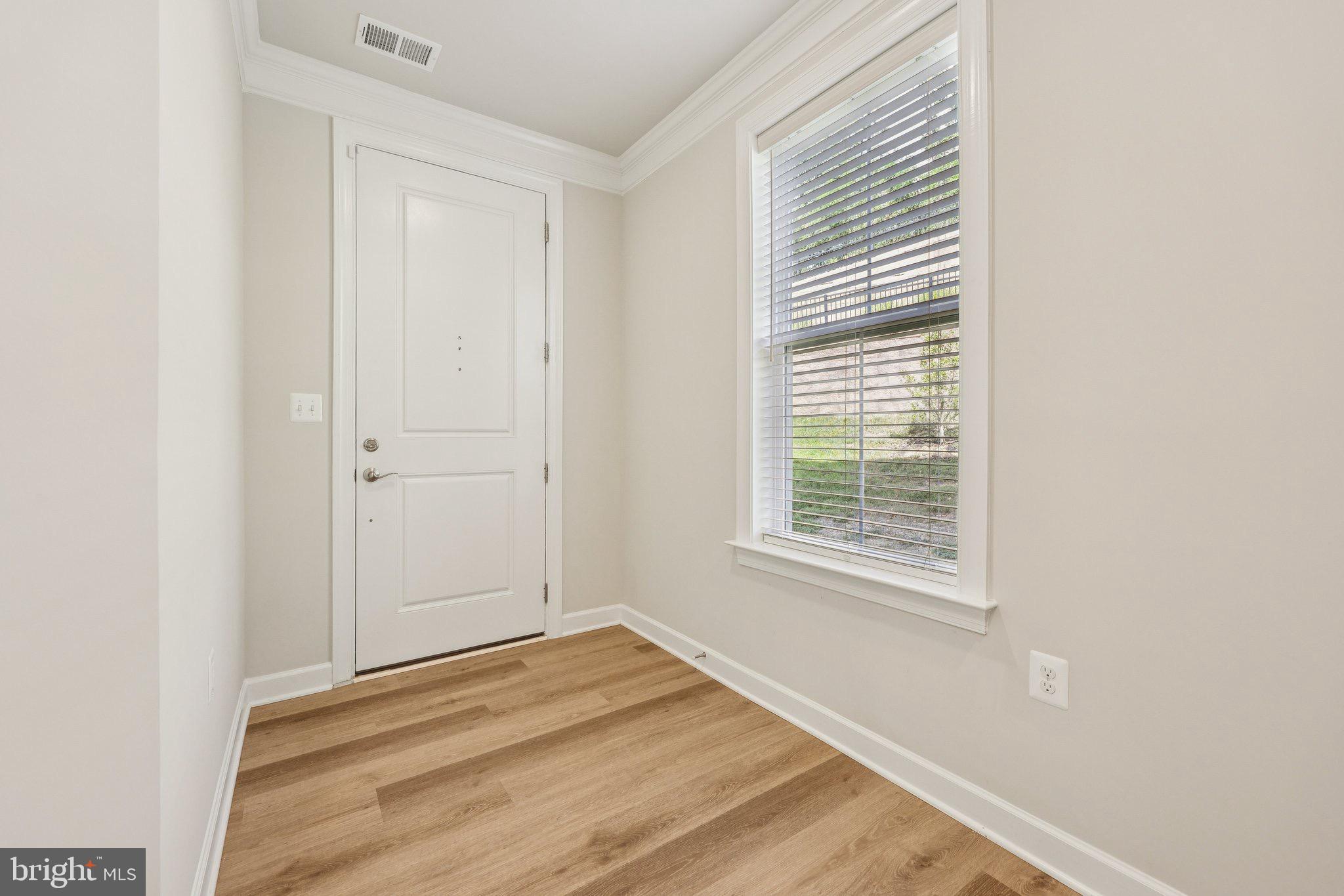 7355 Mountaineer Drive Alexandria, VA 22306 - Photo 12 of 47 a view of empty room with wooden floor