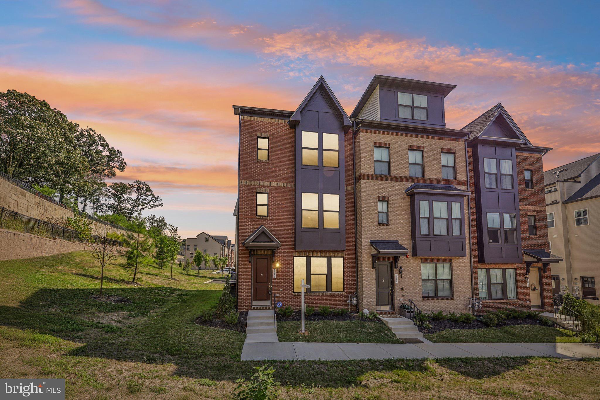 7355 Mountaineer Drive Alexandria, VA 22306 - Photo 2 of 47 a front view of residential houses with yard