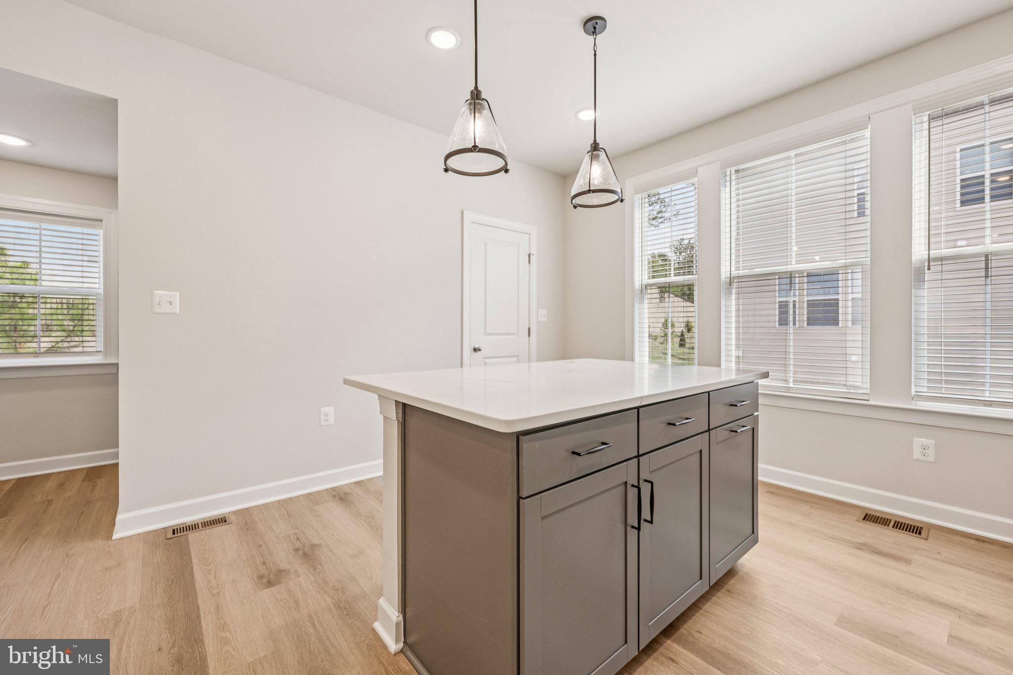 7355 Mountaineer Drive Alexandria, VA 22306 - Photo 22 of 47 a bathroom with a sink a vanity and a large mirror