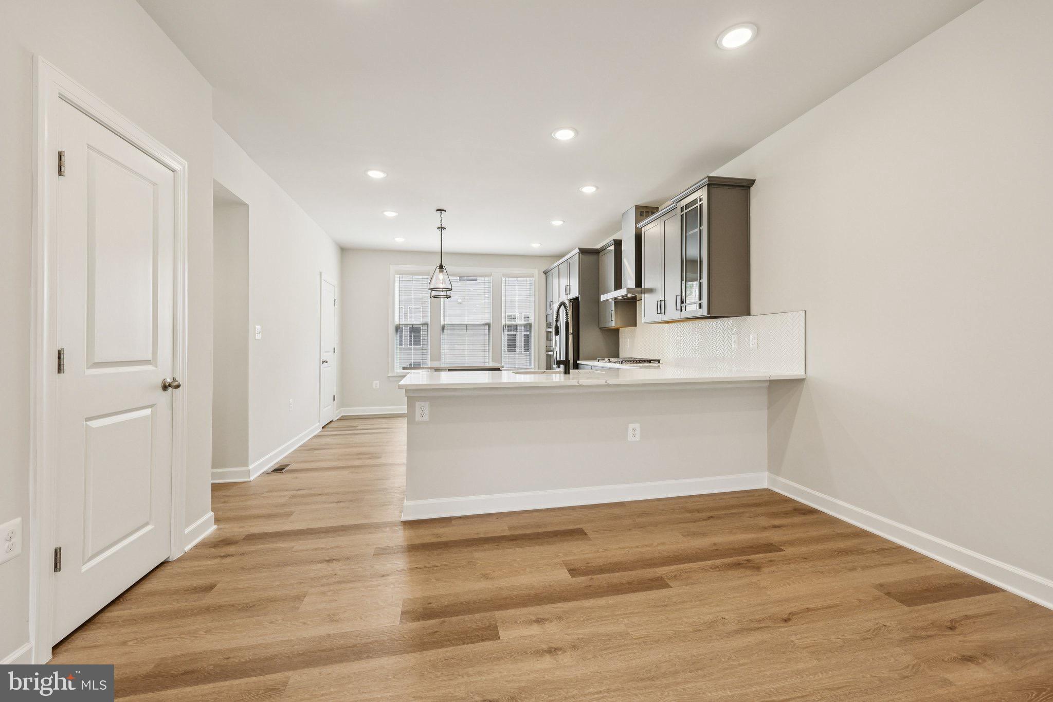 7355 Mountaineer Drive Alexandria, VA 22306 - Photo 24 of 47 a view of kitchen with wooden floor