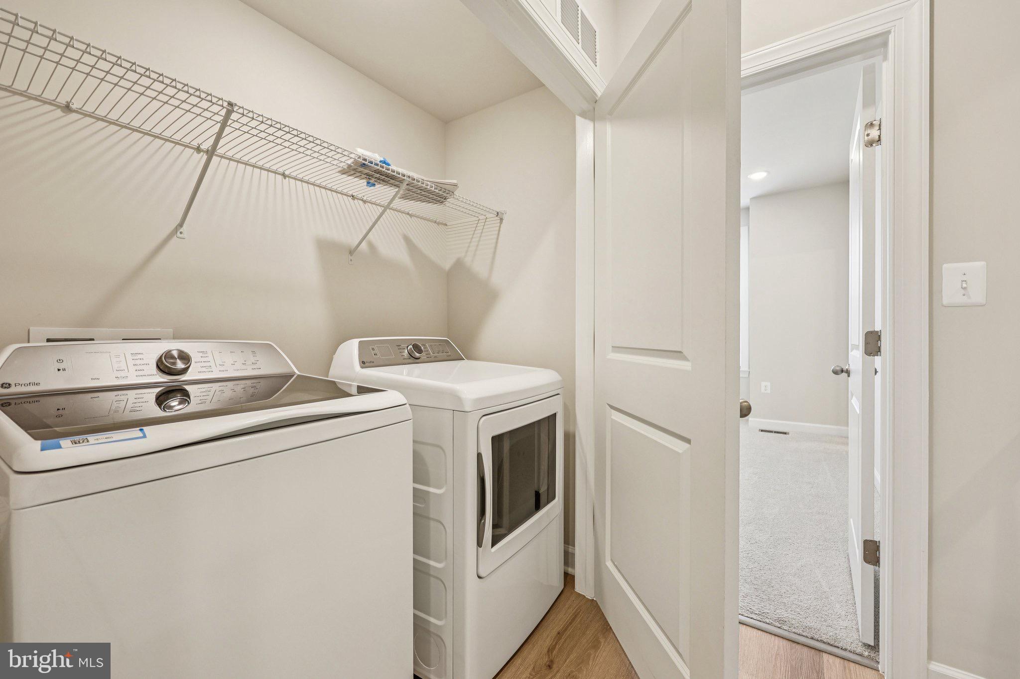 7355 Mountaineer Drive Alexandria, VA 22306 - Photo 31 of 47 a utility room with dryer and washer