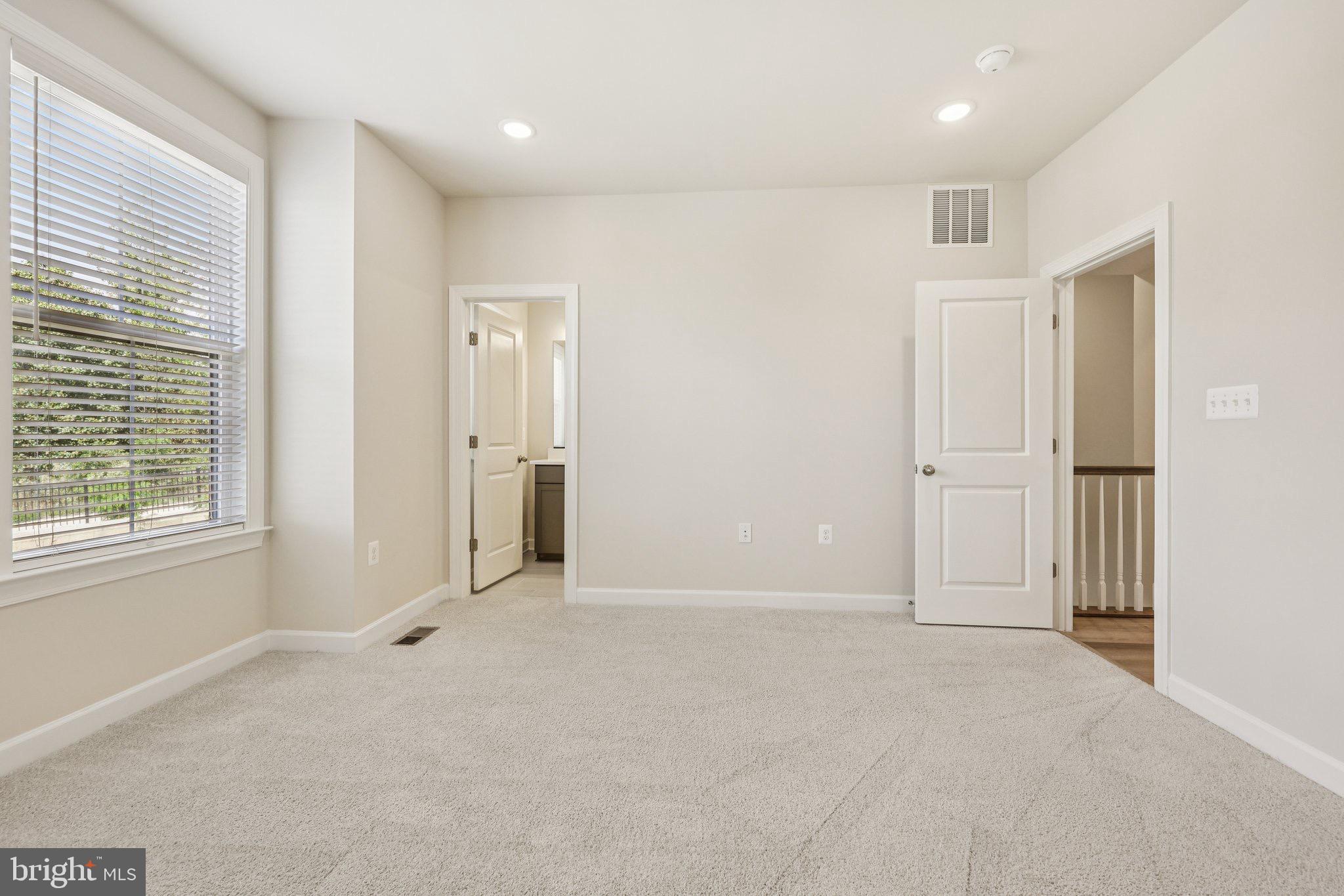 7355 Mountaineer Drive Alexandria, VA 22306 - Photo 32 of 47 an empty room with windows and closet