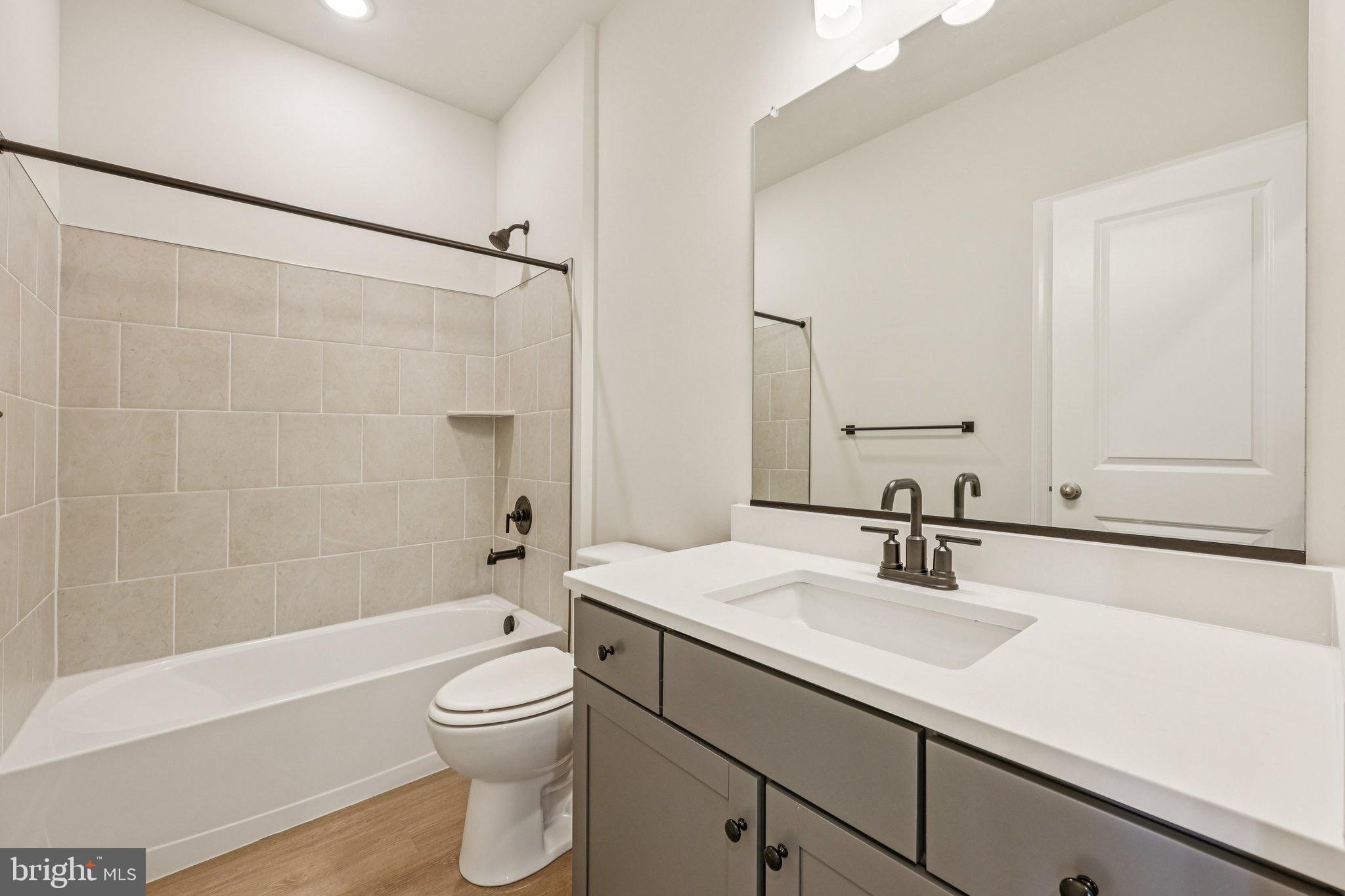 7355 Mountaineer Drive Alexandria, VA 22306 - Photo 43 of 47 a bathroom with a sink a toilet and shower