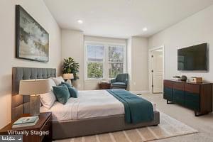 7355 Mountaineer Drive Alexandria, VA 22306 - Photo 8 of 47 a bedroom with a bed and a flat screen tv