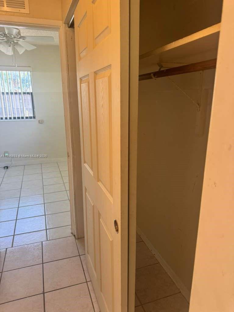 2343 Northwest 28th Street, Unit 12 Oakland Park, FL 33311 - Photo 19 of 34 a bathroom with a shower