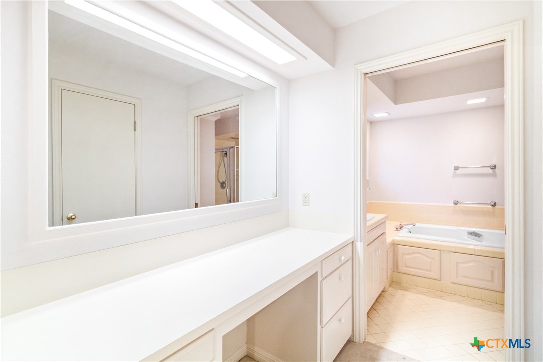 603 Suzanne Street Edna, TX 77957 - Photo 22 of 45 a bathroom with a bathtub and a sink
