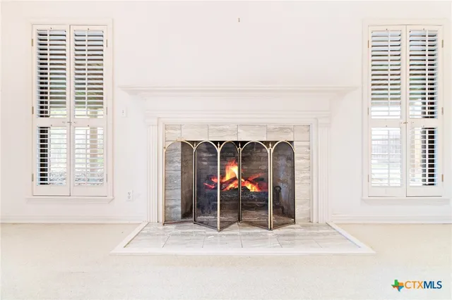 a view of a living room and a window