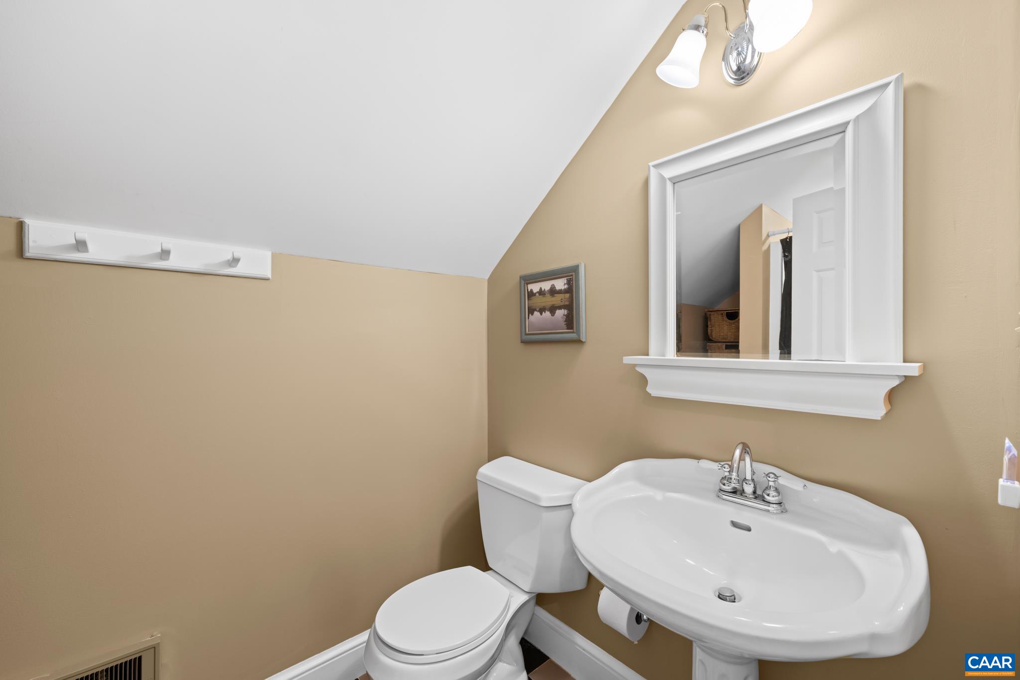 480 Dawsonville Road Barboursville, VA 22923 - Photo 43 of 55 a bathroom with a toilet a sink and mirror