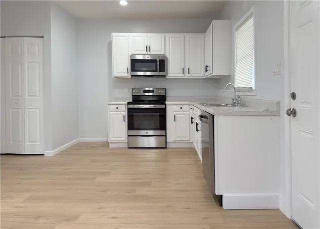 a view of small space with wooden floor