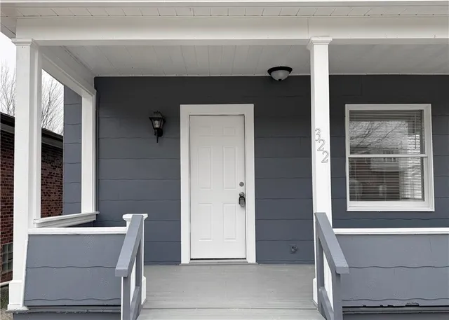 a view of front door and porch