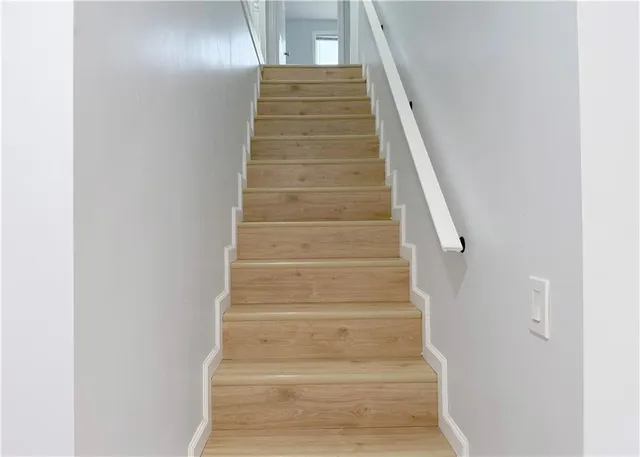 a view of hallway with closet