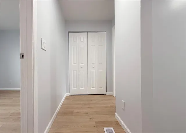 a view of wooden floor and staircase