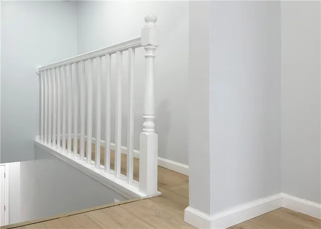a view of empty room with wooden ceiling