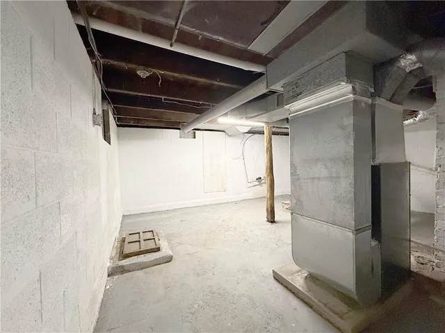 a view of a hallway with windows