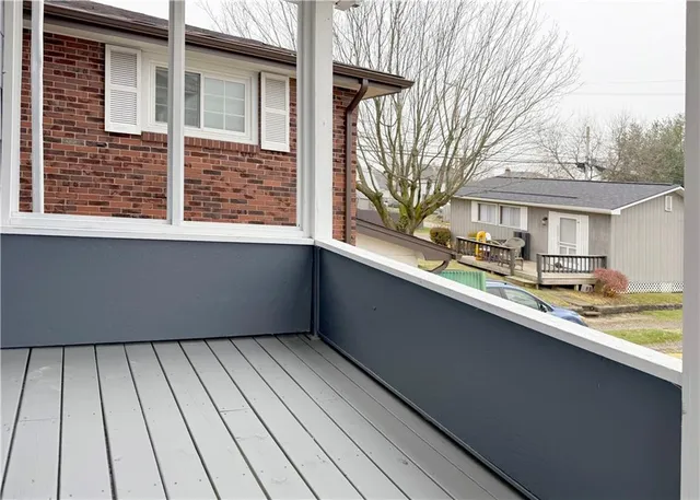 a view of a house with a roof deck