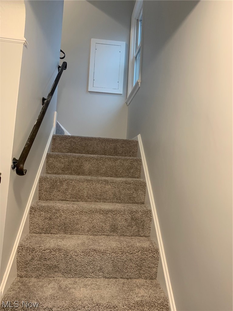 1456 Evanston Road Lyndhurst, OH 44124 - Photo 31 of 32 Staircase featuring carpet