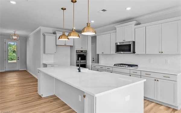 $635,000 | 5504 Penguin Drive, Summerfield, NC 27358