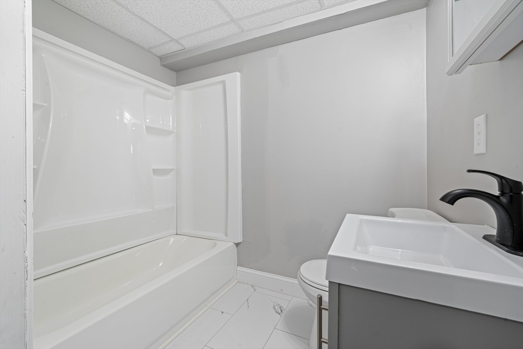 124 Cottage Street Athol, MA 01331 - Photo 19 of 38 a bathroom with a sink and a bathtub