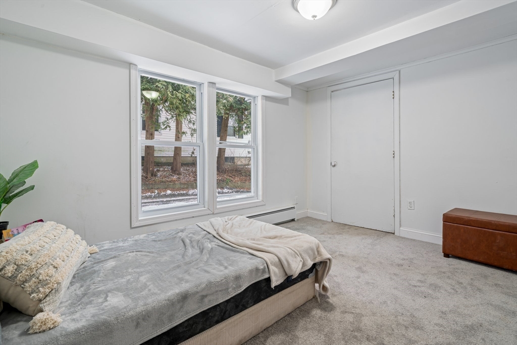 124 Cottage Street Athol, MA 01331 - Photo 20 of 38 a bedroom with a bed and a window