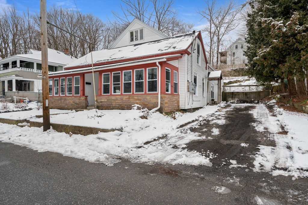 124 Cottage Street Athol, MA 01331 - Photo 2 of 38 a view of a house with a snow in the yard