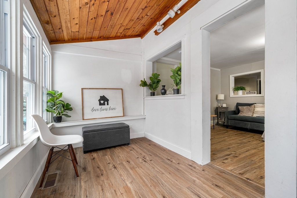124 Cottage Street Athol, MA 01331 - Photo 21 of 38 a living room with furniture and a wooden floor