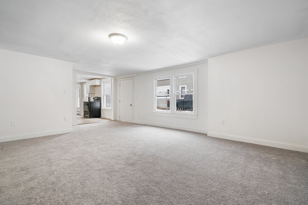 124 Cottage Street Athol, MA 01331 - Photo 34 of 38 an empty room with windows and closet