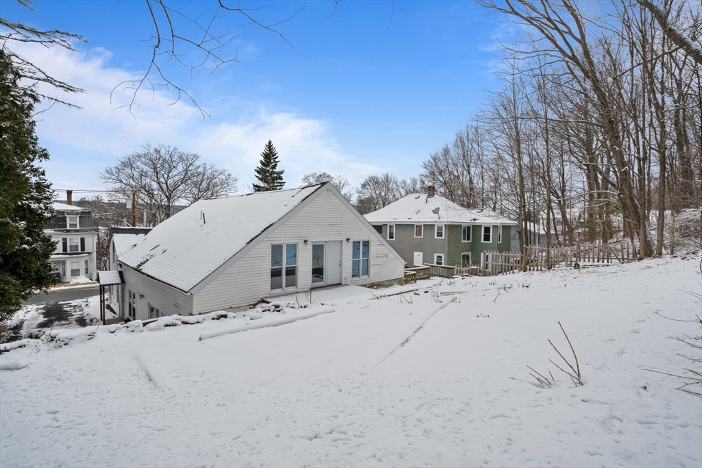 124 Cottage Street Athol, MA 01331 - Photo 38 of 38 a view of a house with snow on the road