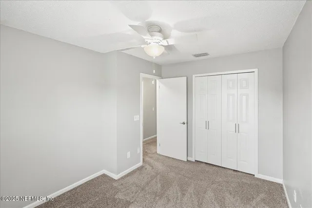 a view of a chandelier in a room