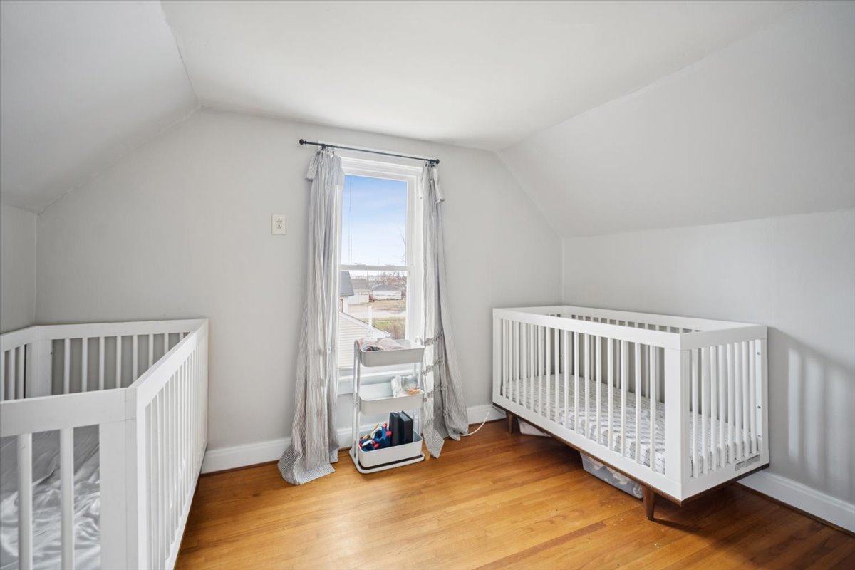 128 North Hadsall Street Genoa, IL 60135 - Photo 12 of 22 a view of livingroom with furniture and floor to ceiling window