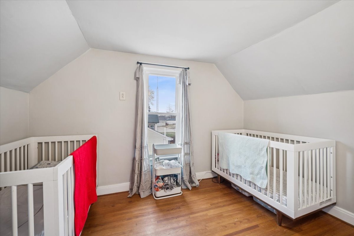 128 North Hadsall Street Genoa, IL 60135 - Photo 12 of 21 a view of livingroom with furniture and wooden floor
