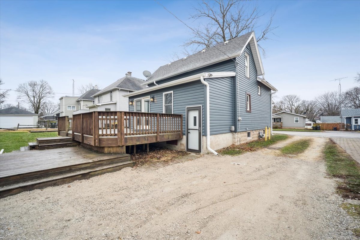 128 North Hadsall Street Genoa, IL 60135 - Photo 17 of 22 a view of a house with wooden fence