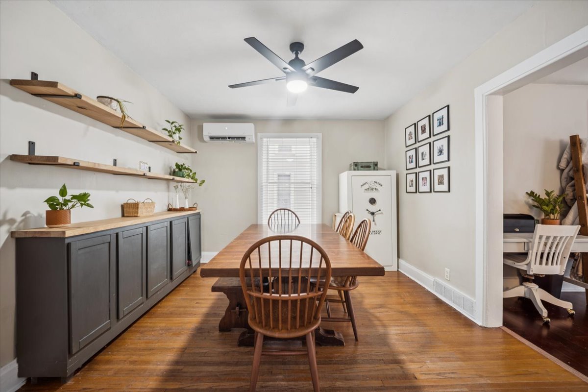 128 North Hadsall Street Genoa, IL 60135 - Photo 5 of 21 a view of a dining room with furniture and wooden floor